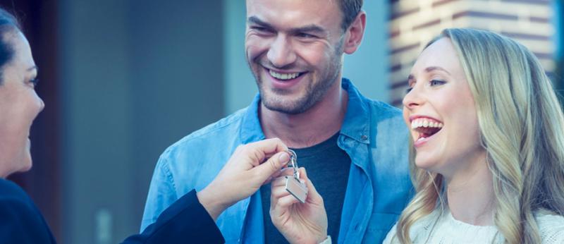 new home owners receiving keys