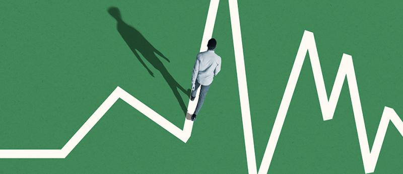 Business man walking on a white line representing the ups and downs of the market