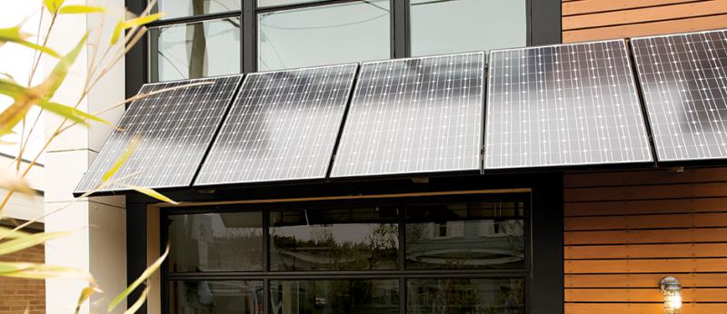 Photo of a modern home with solar panels