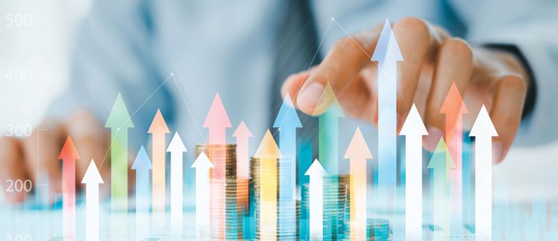 photo of a business mans hand with data bar chart
