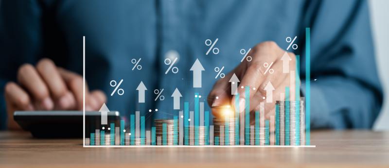 hands with calculator and money with bar chart illustration