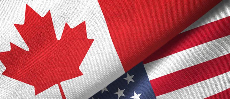 photo of Canadian and American flags folded together