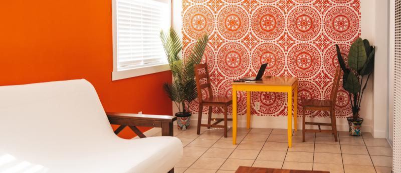 Orange living room city apartment.
