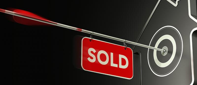digital illustration of an arrow with a sold sign attached to it hitting a house target