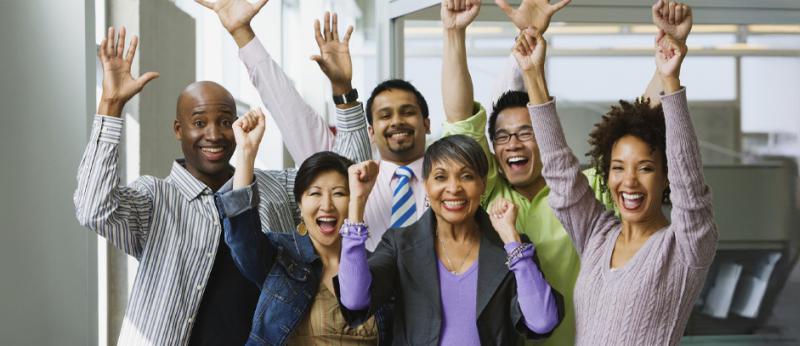 Multiracial group cheering