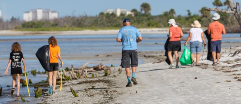 A group of volunteers cleaning waterways during Clean Up Florida Waters 2025 event 