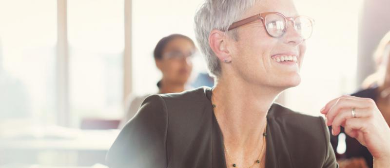 woman smiling in a class