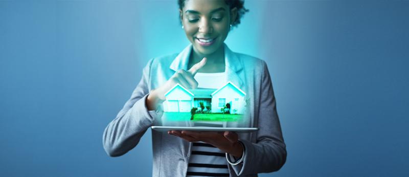Woman holding house, potential listing