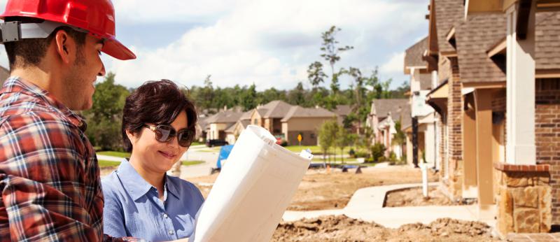 contractor meeting on home building site