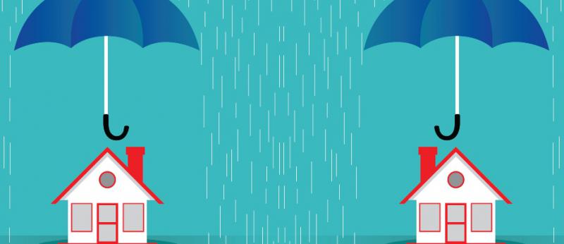 house covered by umbrella during rainstorm