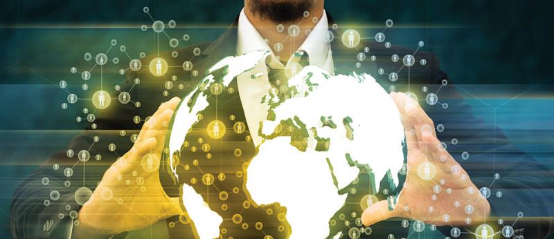 Man holding digital globe