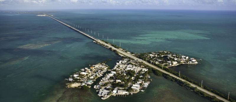 Aerial view of 7-mile bridge crossing a small Florida Key