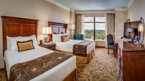 hotel room with two beds at rosen shingle creek
