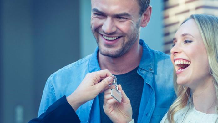 new home owners receiving keys