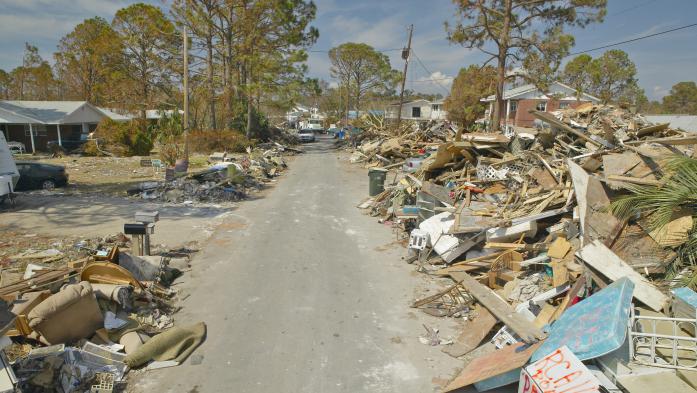 debris along Florida road after hurricane Ian