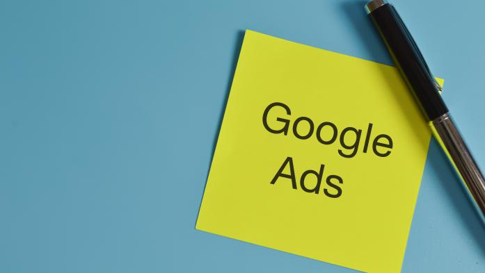 top view of pen and memo note written with Google Ads 
