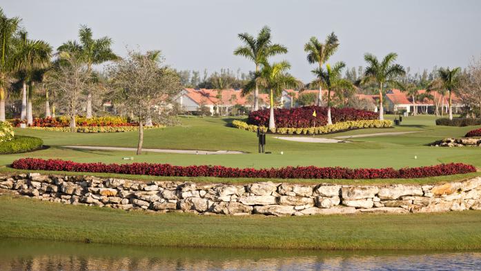 Condos behind one of the links on a Florida golf course fairway