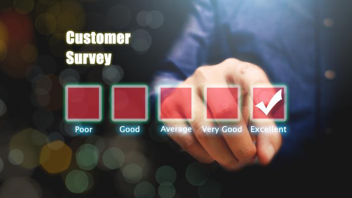 Hand with 5 review choices selects excellent