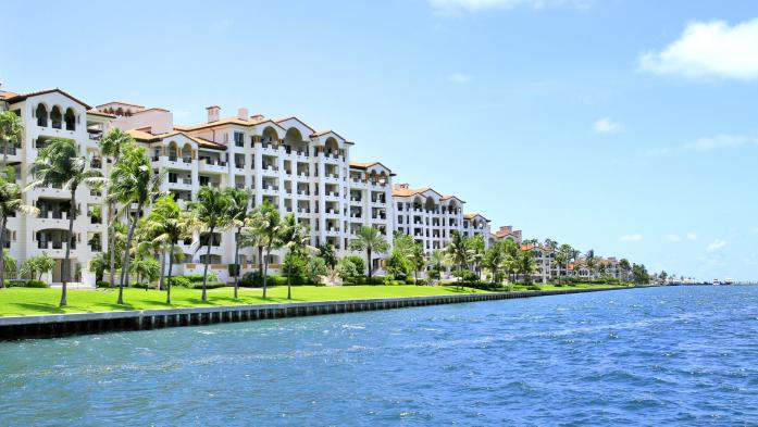 row of condos on the ocean