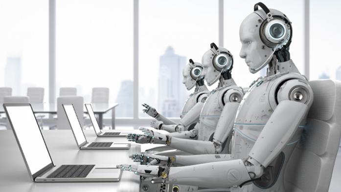 Line of robots sits in front of laptops with phones to their ears