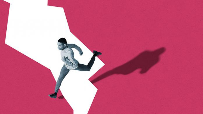 Photo illustration of a young man jumping over a crack in a pink background color