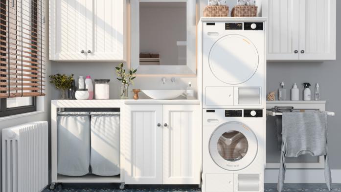 Modern Laundry Room With Washing Machine, Dryer, White Cabinets and Drying 