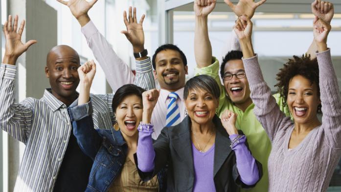 Multiracial group cheering