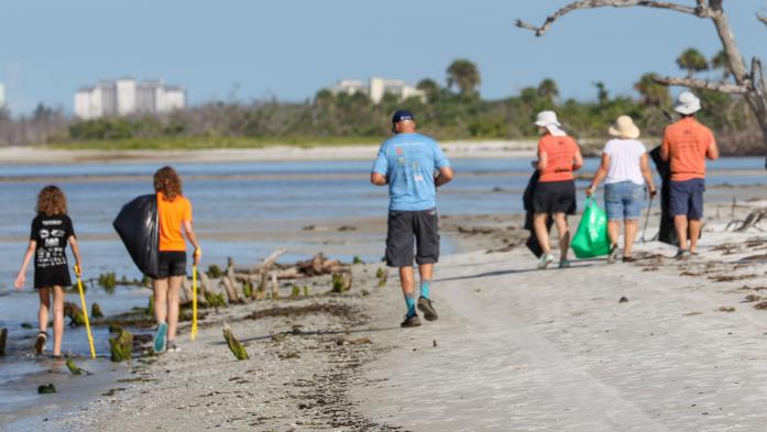 A group of volunteers cleaning waterways during Clean Up Florida Waters 2025 event 
