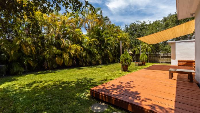 backyard deck overlooking woodlands 