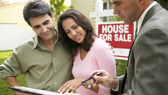 Happy couple enjoying homeownership