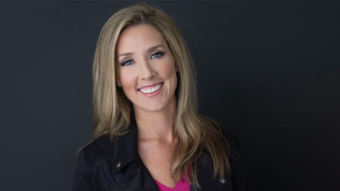Photo of Lauren Sisler on grey background