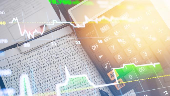 interest rates illustration with calculator and fever lines