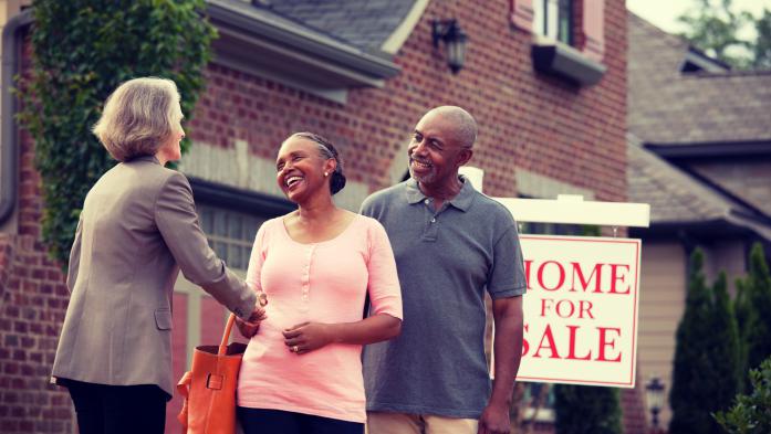 realtor selling house to couple