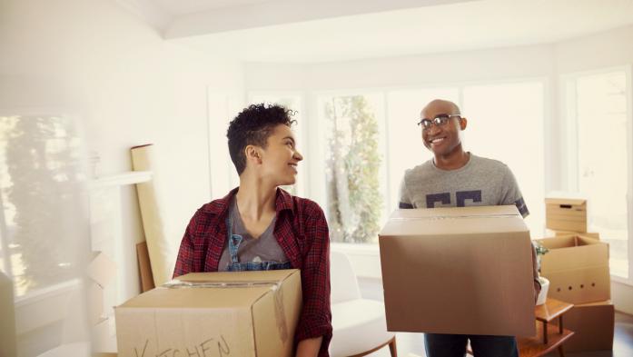 couple with moving boxes