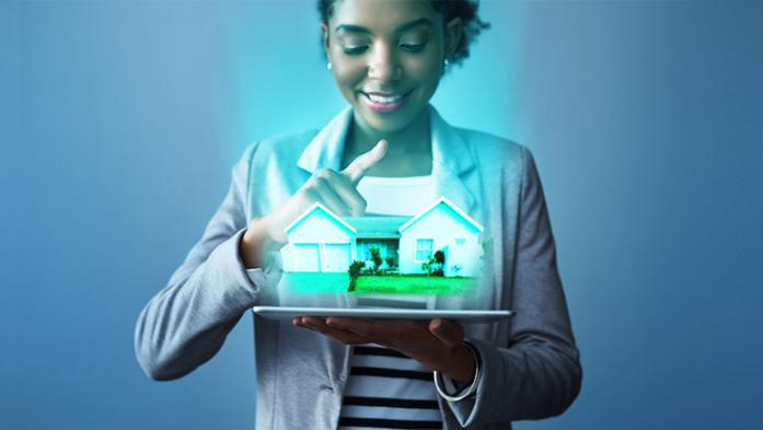 Woman holding house, potential listing