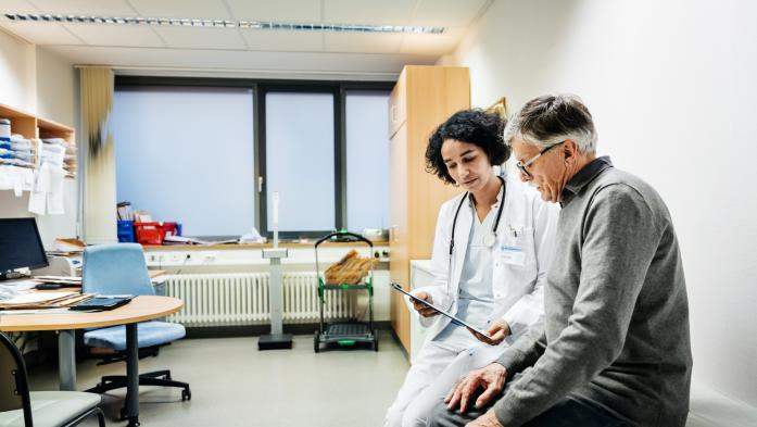 patient visiting with doctor