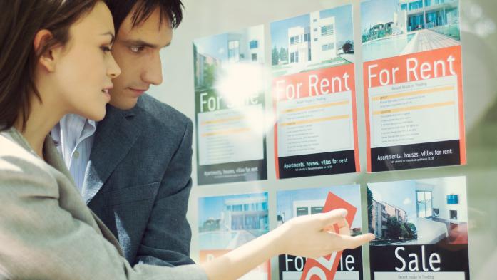 couple looking at houses for rent