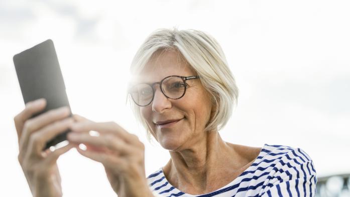 woman looking a cell phone