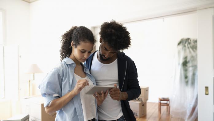 Couple looking at an ipad