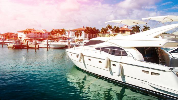 boat in canal passing a dock