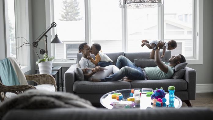 mom and with small children on couch