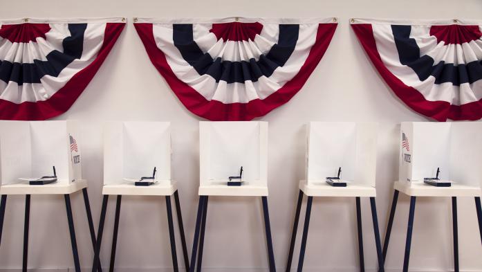 Line of empty voting booths