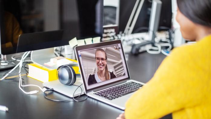 woman looking at laptop screen