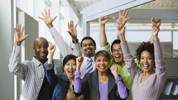 Multiracial group cheering