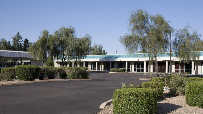 Strip mall with an empty parking lot