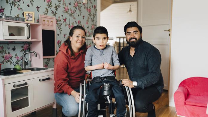 Playroom with Mom, Dad and child in a wheelchair