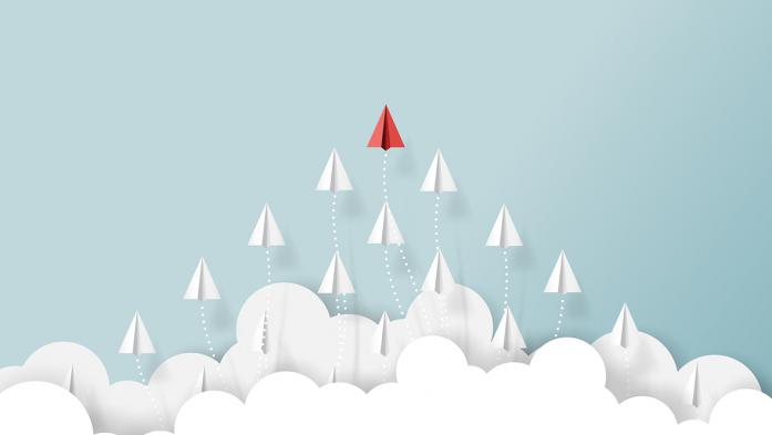 paper airplanes flying above clouds with one taking the lead