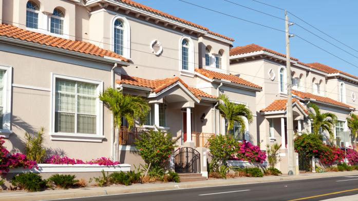 Row of tan townhouses