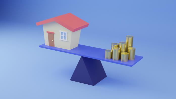 Digitally generated image of a house on a balance board with money on it in front of a blue background