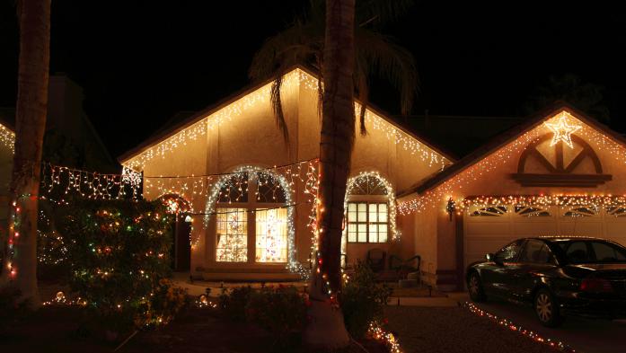 Night photo of Florida home with Christmas lights